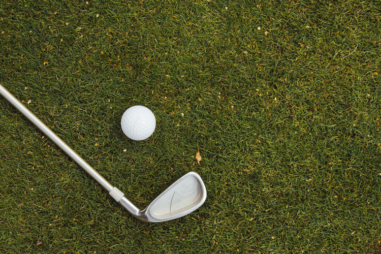 Golf ball on grassy field