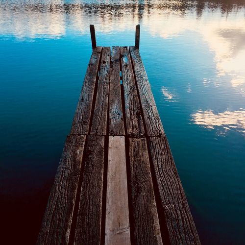 High angle view of wooden pier in lake