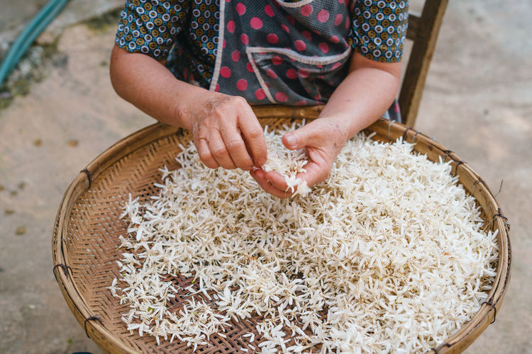 Low section of man preparing food