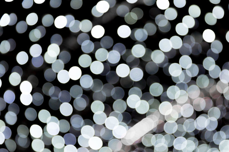 Abstract blur holiday bokeh background. many round light on background
