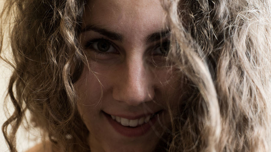 Close-up portrait of happy beautiful woman