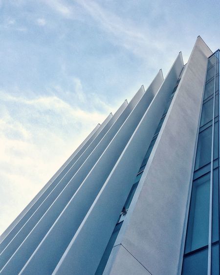 Low angle view of modern building against sky