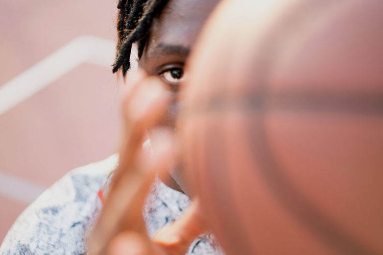 Portrait of the black man with the basketball