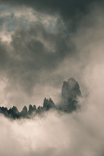 Rocky mountain peak and stormy clouds. tre cime di lavadero italy