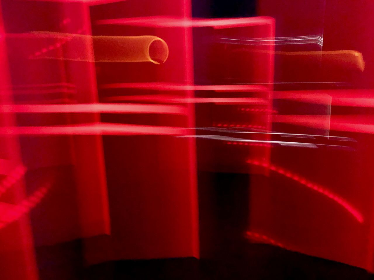 CLOSE-UP OF RED WINE GLASS WITH LIGHTS