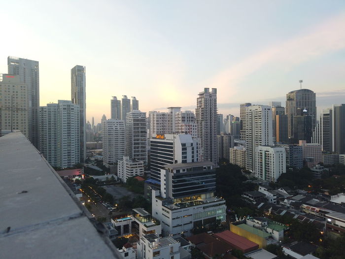 High angle view of buildings against sky during sunset