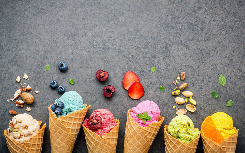 Directly above shot of ice creams and fruits