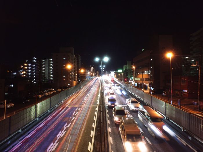 Blurred motion of car moving on road at night