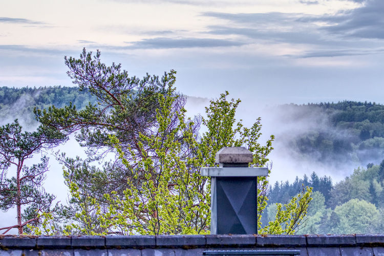 Scenic view of a foggy valley