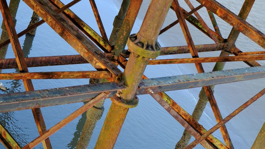 Low angle view of rusty metal structure