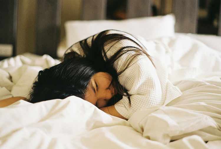 Man sleeping in bed