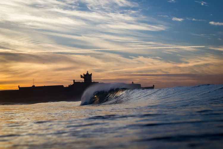 Scenic view of sea against sky during sunset