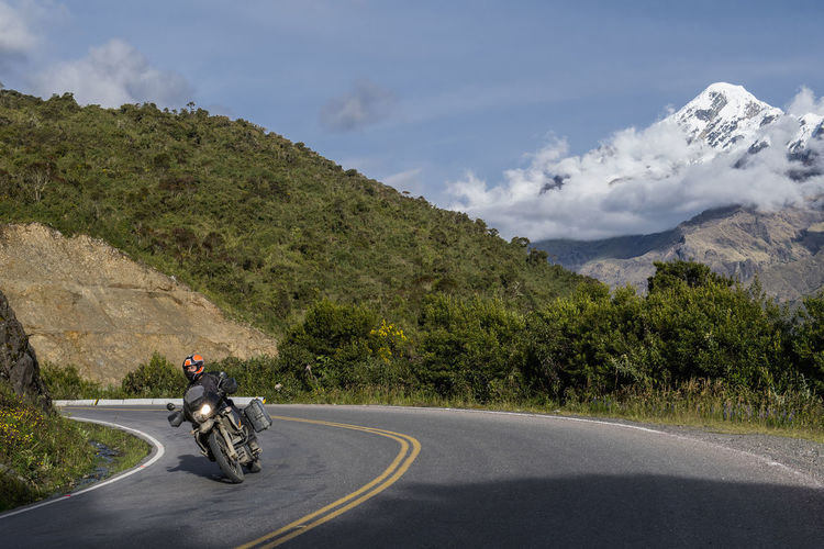 Man driving his touring motorbike down from the abra de malaga pass