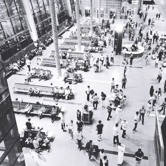 High angle view of people at airport lobby