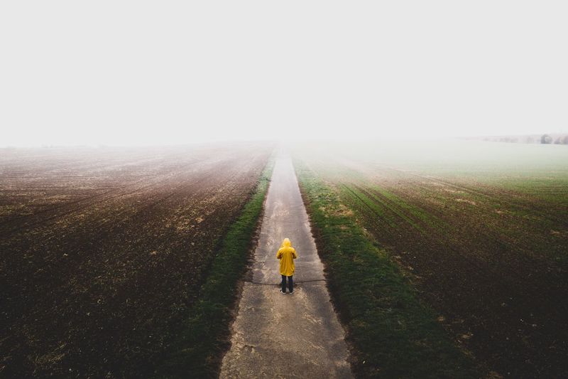 Alone Alone... Copy Space Field Landscape Land One Person Road Nature Rear View Direction Sky Rural Scene Day Outdoors The Way Forward
