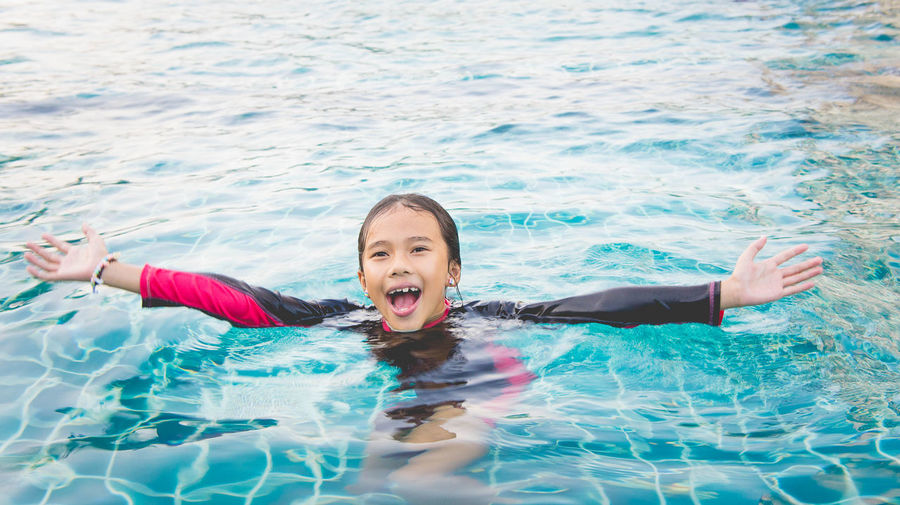 Portrait of girl in swimming pool