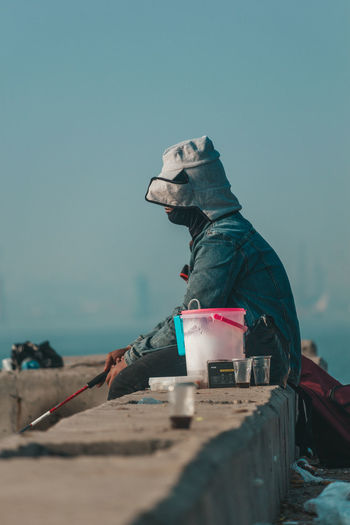 Low angle view of fishing against the sky
