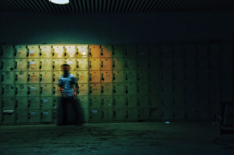 Man standing in corridor