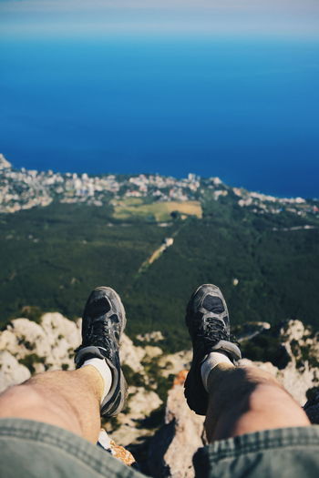 Low section of man against landscape