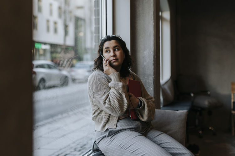 Young woman looking away