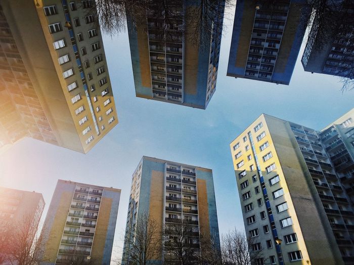 Low angle view of buildings against sky in city