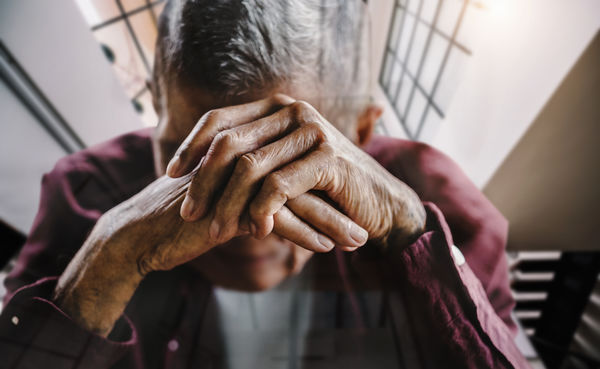 Close-up of depressed senior man