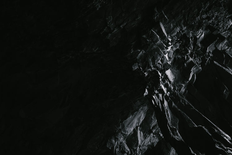 Low angle view of rock formation at night