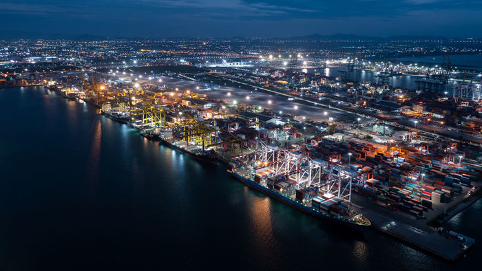 Aerial view shipping port international and container cargo ship export and import business service
