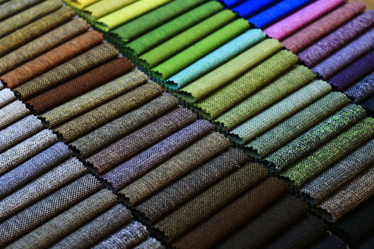 Full frame shot of multi colored fabrics, fabric samples