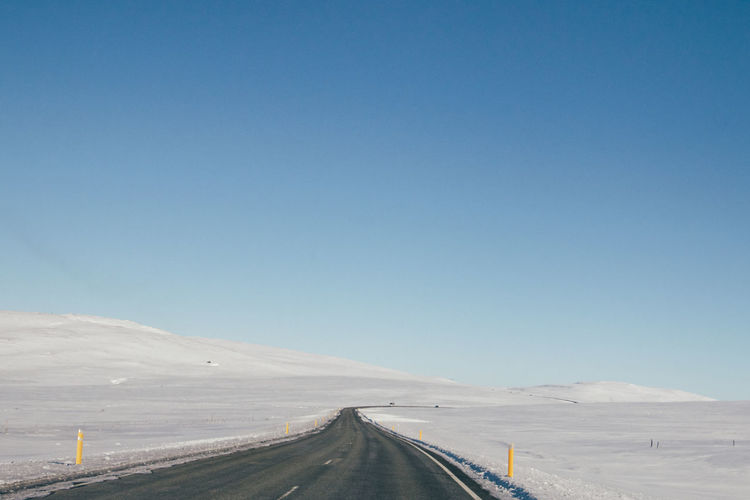 Road against clear sky