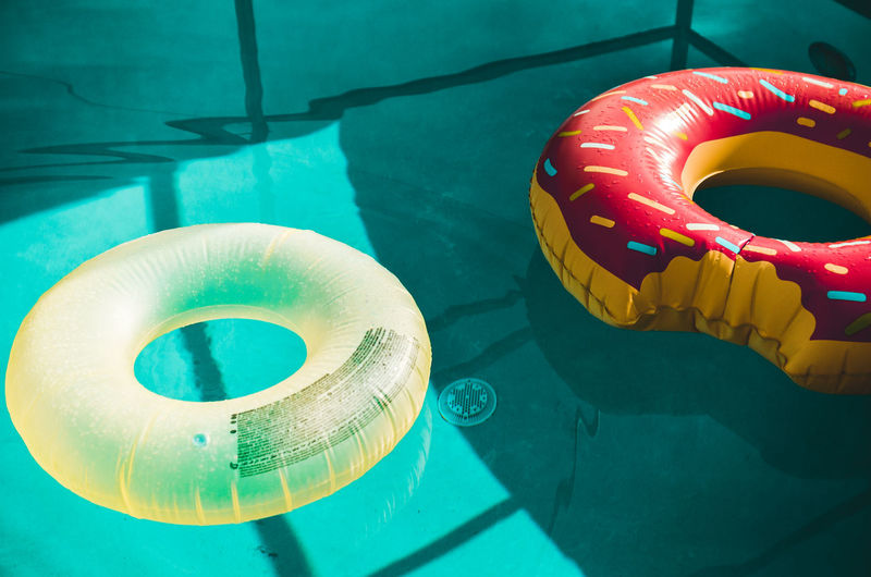 Inflatable rings in swimming pool