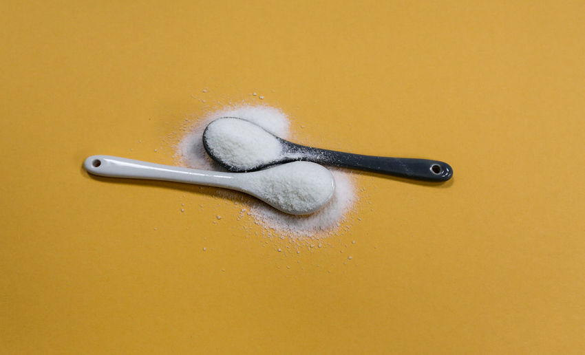 Collagen powder, placed in a spoon