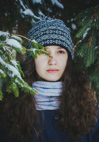 Portrait of cute girl in park during winter