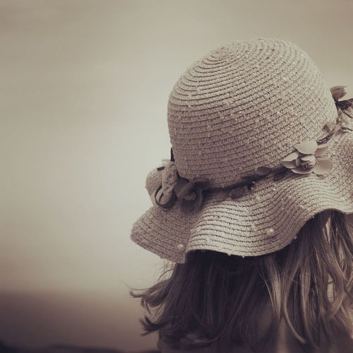 Close-up of woman wearing hat
