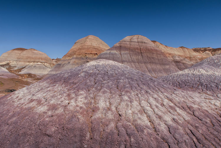 Landscape of purple striped badlands at blue mesa in petrified forest national park in arizona