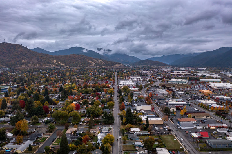 Grants pass, oregon. road leading to the mountains. aerial photo.