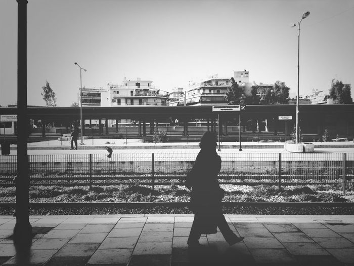 Woman walking in city