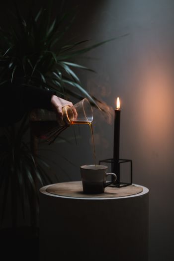 Close-up of tea light candles on table