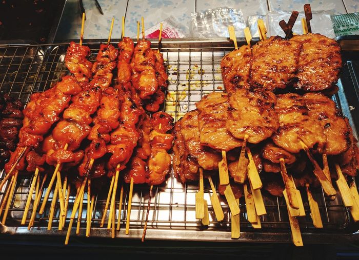 Close-up of meat on barbecue grill