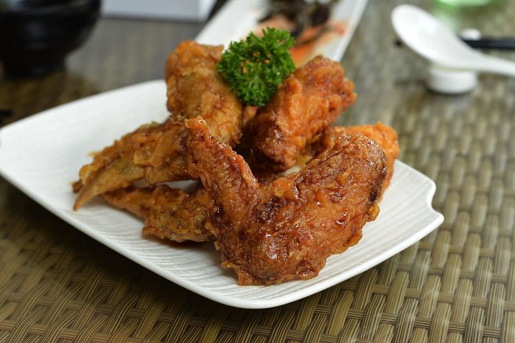 Close-up of korean fried chicken served in plate on table