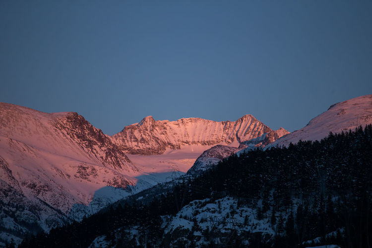 Alpenglow on nearby mountains in whistler canada