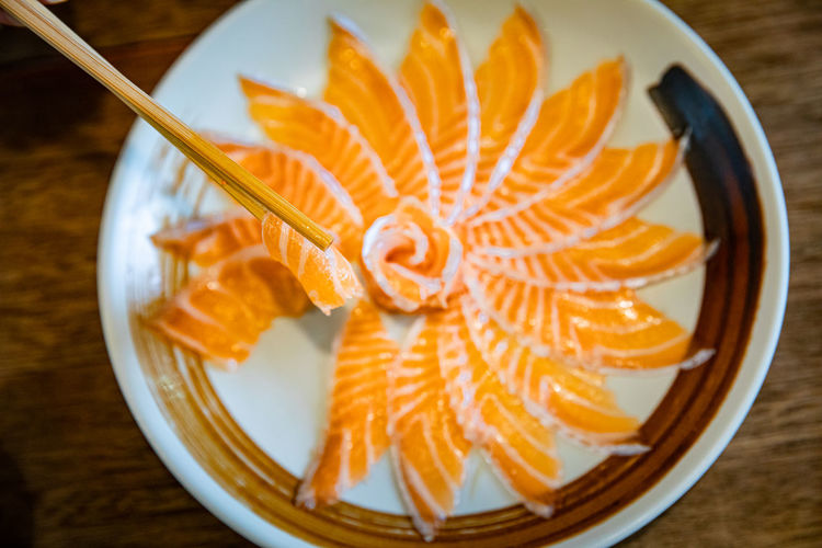 High angle view of orange slices in bowl on table
