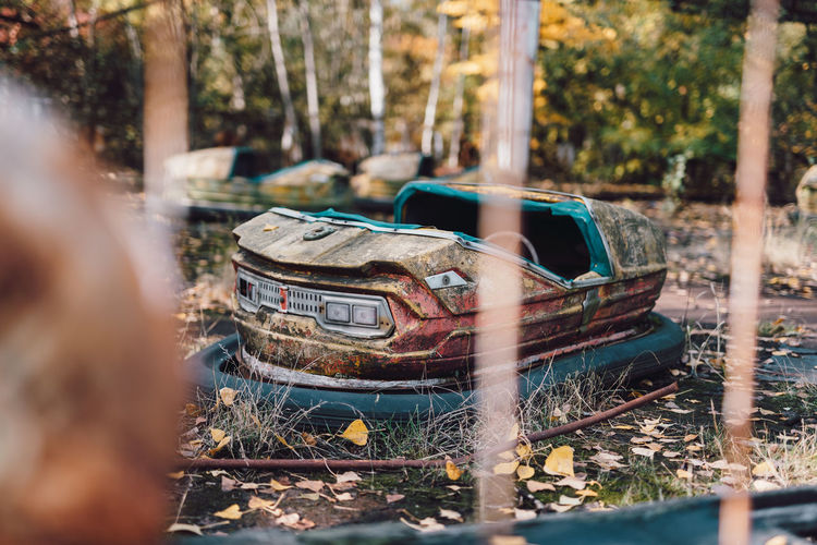Abandoned car on land