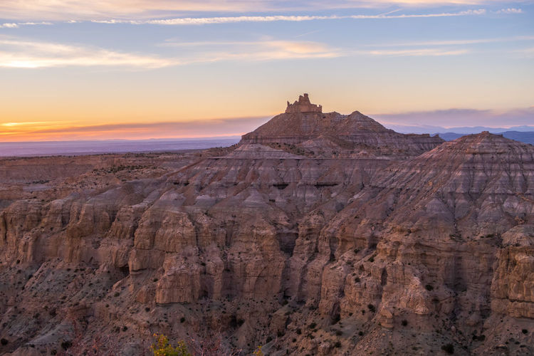 Landscape of massive rock formation at sunset in angel peak wilderness in new mexico