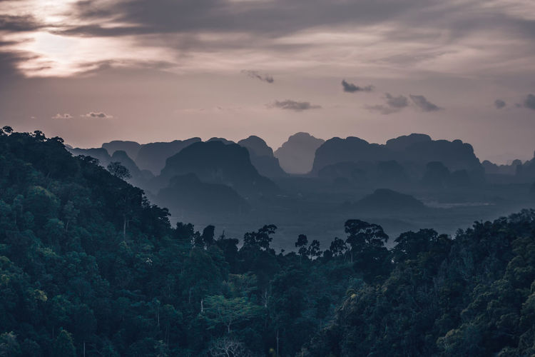 Scenic view of mountains against sky during sunset