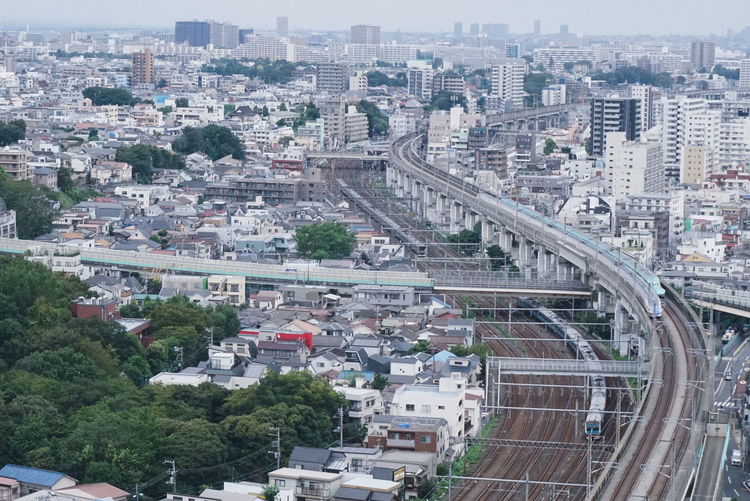 Bullet trains in tokyo through the city