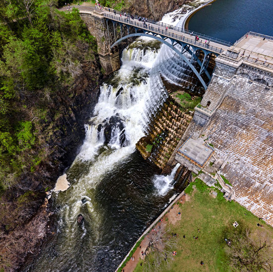High angle view of waterfall by river