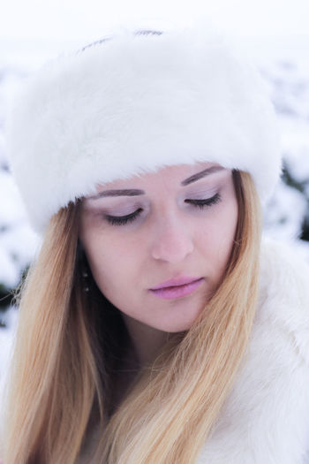 Close-up of woman during winter