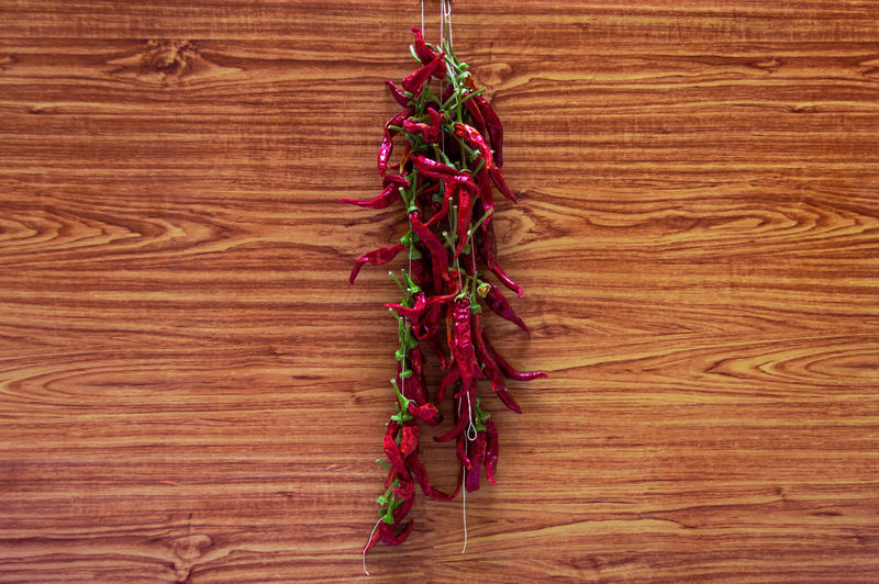 High angle view of red chili peppers on table