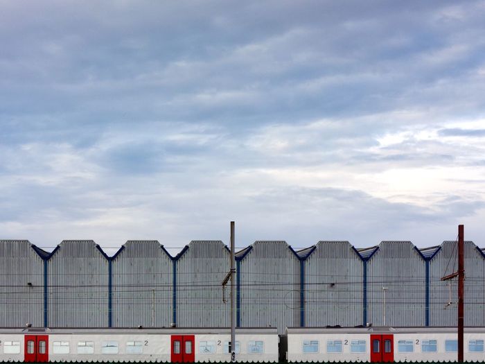 Panoramic shot of warehouse against sky